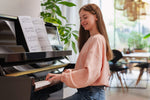 Yamaha B20 Upright Piano in Polished Ebony with Brass Fittings | Thompson Pianos